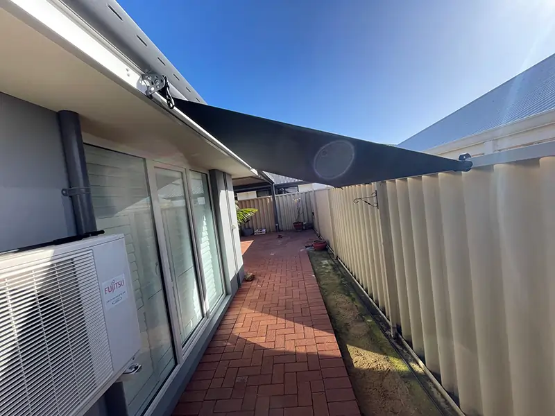 Outdoor Shades WA roof-to-fence blinds in Perth shading a side passage