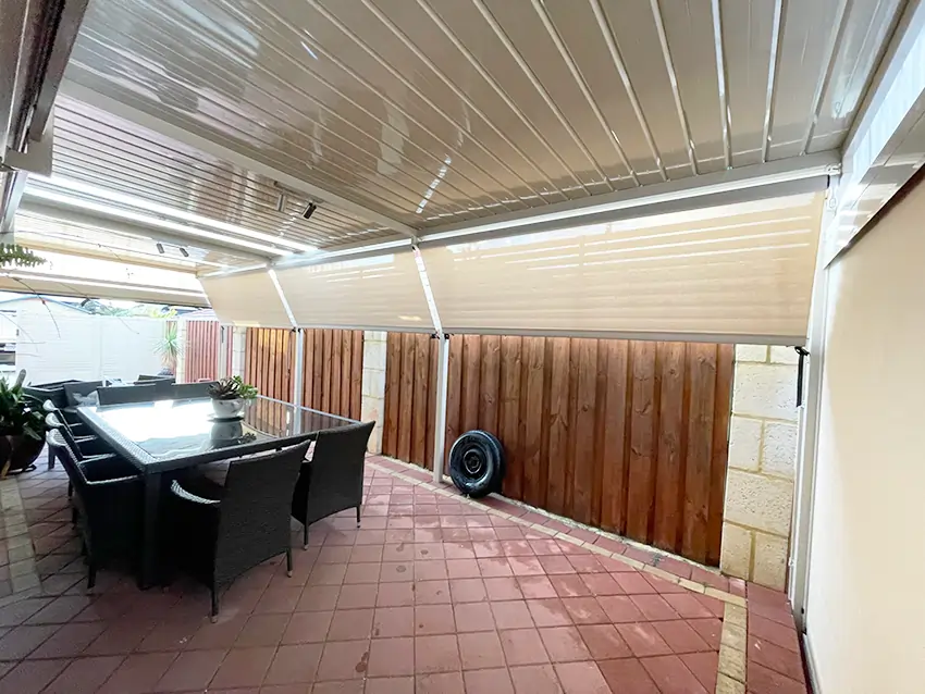 Fence-mounted outdoor blinds in Perth over an alfresco dining area — installed by Outdoor Shades WA