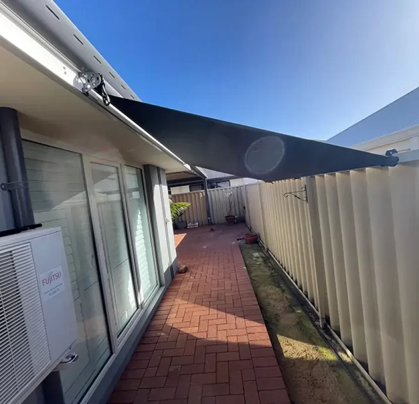 Outdoor Shades WA roof-to-fence blinds in Perth shading a side passage
