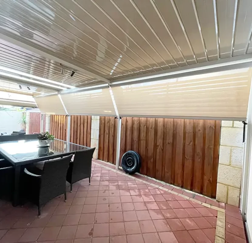 Fence-mounted outdoor blinds in Perth over an alfresco dining area — installed by Outdoor Shades WA