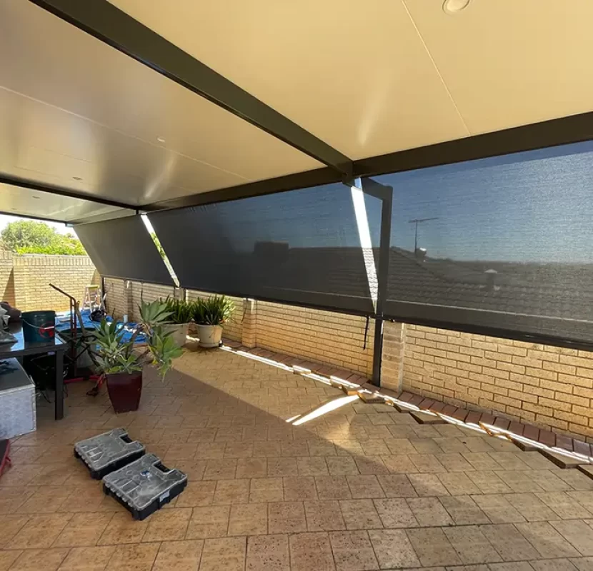 Roof to fence shade solution installed by Outdoor Shades WA providing privacy and sun protection for a patio area