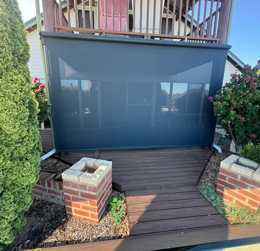 Straight drop outdoor blinds installed by Outdoor Shades WA providing privacy and sun protection for a deck area